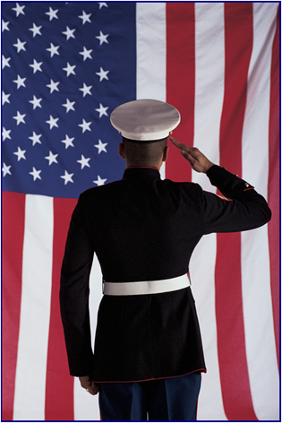 Man in U.S. Marine Corps Uniform Saluting to American Flag