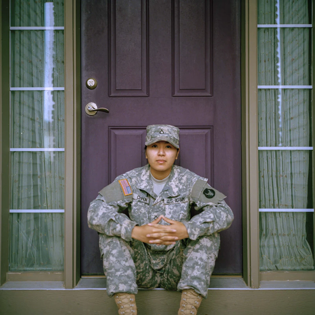 Veteran sitting on front porch