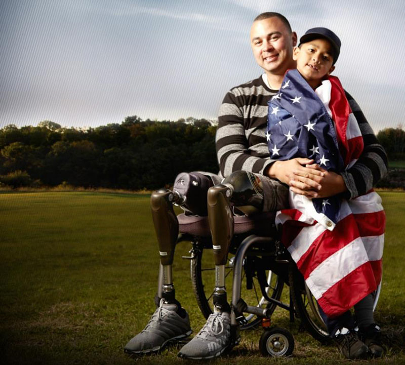Wounded Veteran with his child